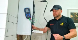 Steven carrying out safety and performance checks during a boiler service