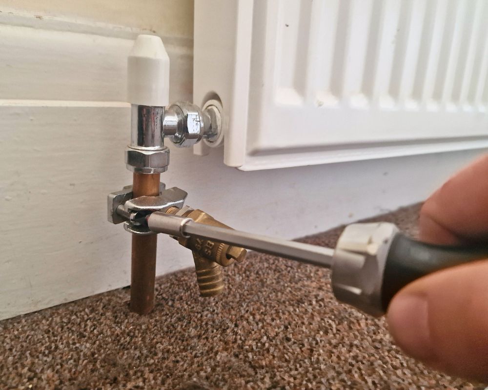 Self cutting drain valve being fitted
