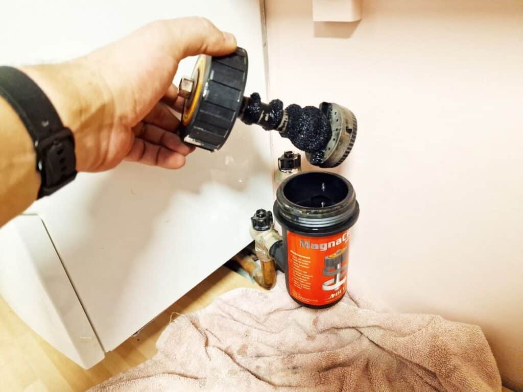 how to clean a Magnaclean filter