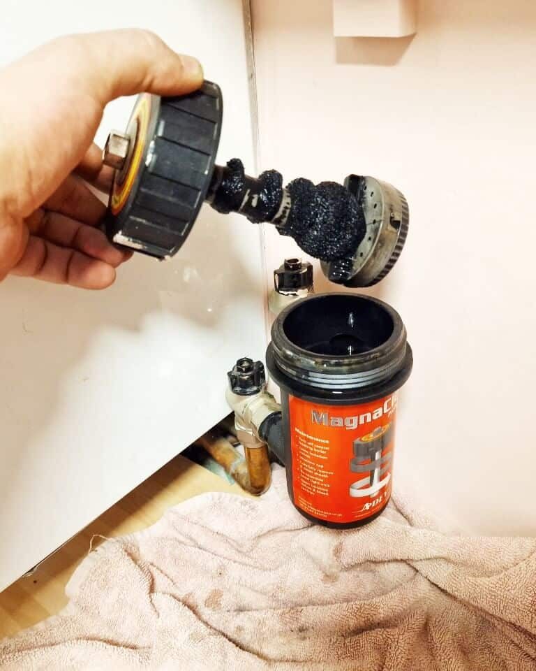 how to clean a Magnaclean filter