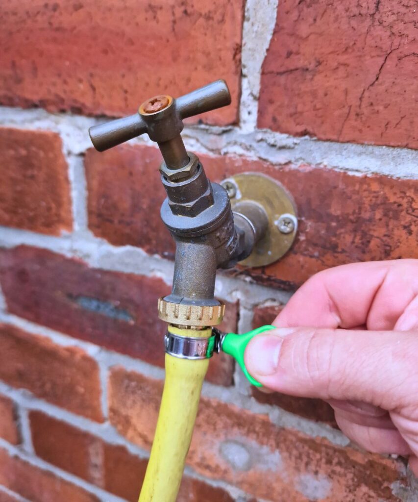 Hose clip connected to outside tap