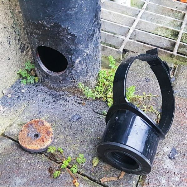 Hole drilled in cast iron soil pipe