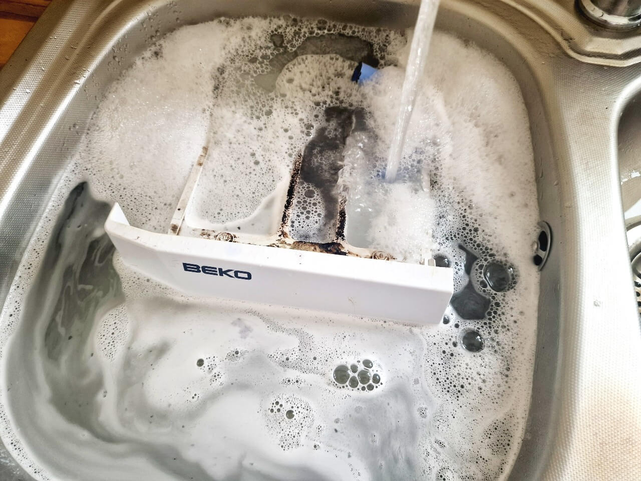How to Fix a Washing Machine Not Draining Full Guide