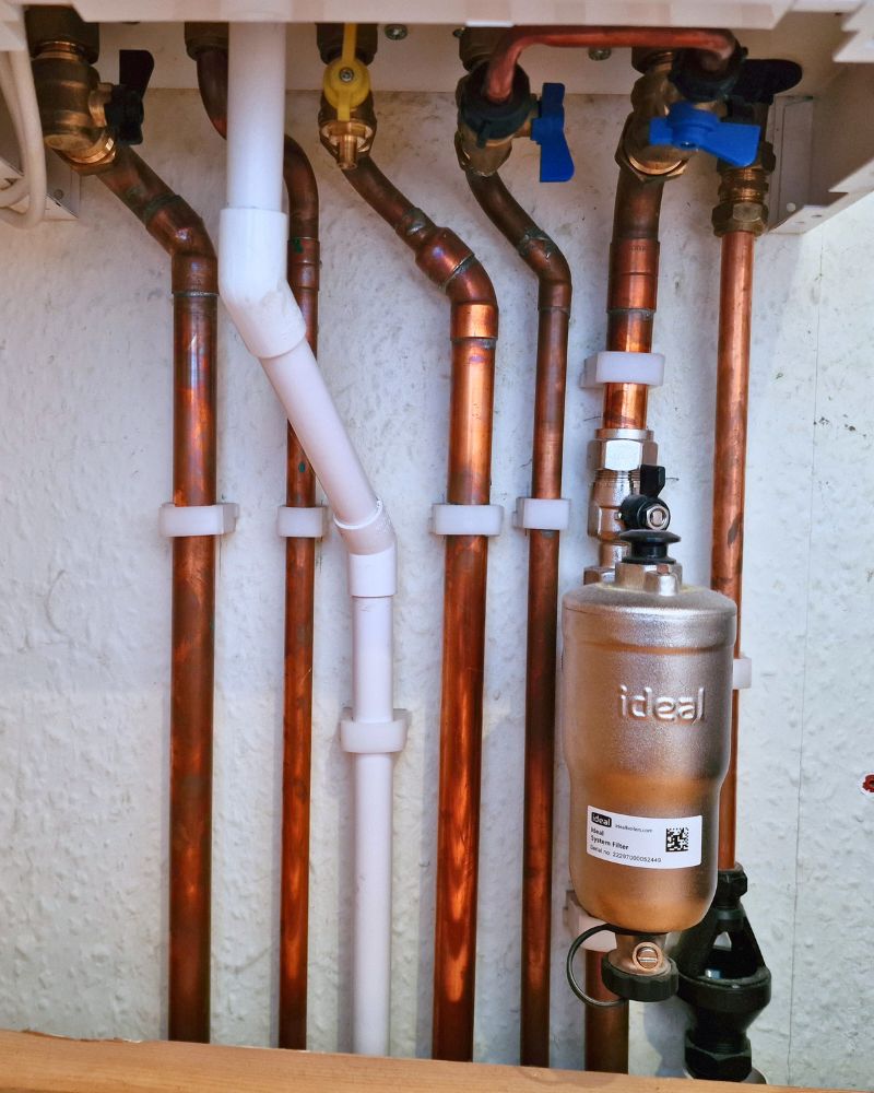 Condensate pipe under boiler