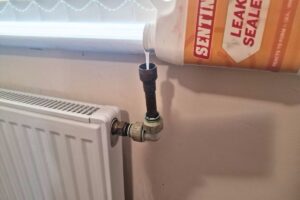 Putting leak sealer in central heating system