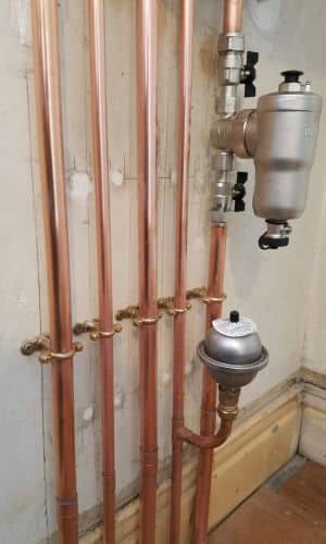 new copper pipes fitted under boiler