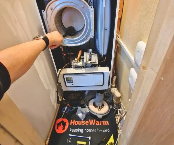 cleaning heat exchanger on a boiler service